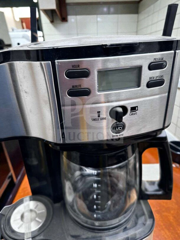 Brand new 12-cup programmable coffee machine, stainless steel & black, glass carafe, single serve/carafe options, fully operational.