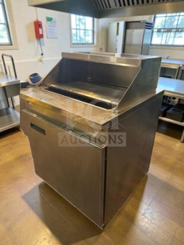 Randell 9412-2-7 stainless steel refrigerated sandwich prep table, pristine condition, one-door, 8.62 cu. ft., NSF/UL listed.