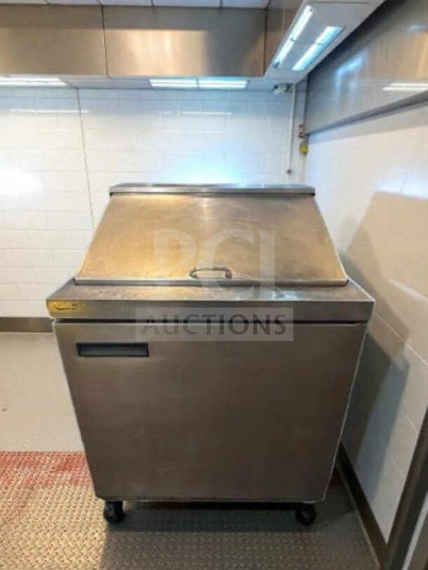 Delfield 4432NP-12M refrigerated prep table, stainless steel, 32", 12 pan capacity, excellent condition, NSF/UL listed.
