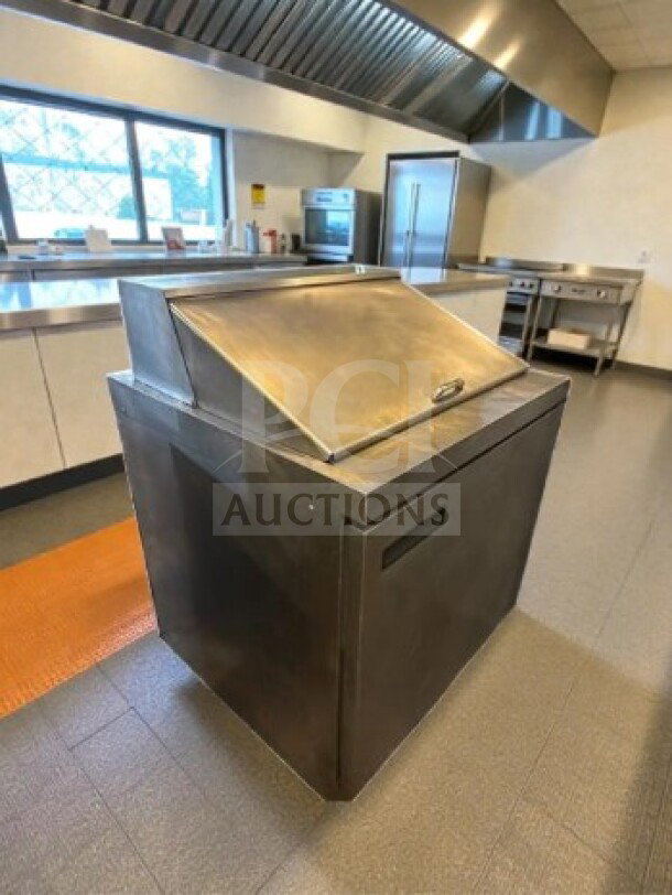 Delfield 4432NP-12M 32" refrigerated prep table, stainless steel, 12 pan capacity, excellent condition, NSF/UL listed.