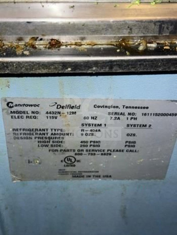 Delfield 4432NP-12M label showing model, refrigerant type R-404A, design pressure, and UL certification.
