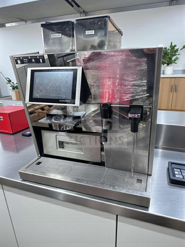 Thermoplan Black&White 3 BW3 espresso machine, 208V, UL & NSF listed, touchscreen display, dual bean hoppers marked "Regular" and "Decaf."
