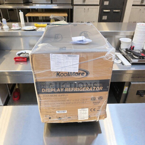 Brand new KoolMore CDC-7C-SS 48-inch countertop bakery display refrigerator in original sealed box, 7 cu. ft., ETL listed.