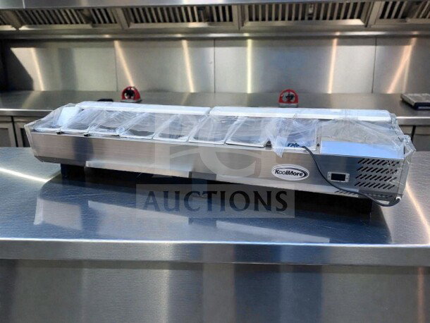 Brand new KoolMore SCDC-8P-SG refrigerated prep rail, 8-pan capacity, glass sneeze guard, in original packaging, UL listed.
