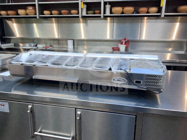 Brand new KoolMore SCDC-8P-SG refrigerated countertop prep rail with glass sneeze guard, 8-pan capacity, UL listed.