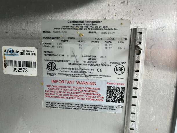 Close-up of label on Continental SW72-30M sandwich prep table, showing model, power supply, refrigerant type, and certifications.