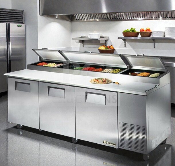 True TPP-93, 93" commercial pizza prep table; pristine condition, 3-door, cutting board top, fully tested.