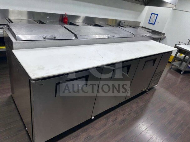 Pristine True TPP-93 commercial pizza prep table, 93", 3-door, cutting board top, fully tested, excellent condition.