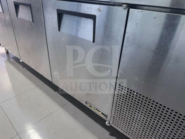True TPP-93 pizza prep table, 93-inch, three-door, cutting board top, stainless steel, pristine condition, fully tested.