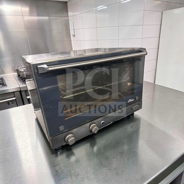 Cadco OV-013/XAF-013-US commercial countertop convection oven, refined condition, 120V, NSF & UL listed.