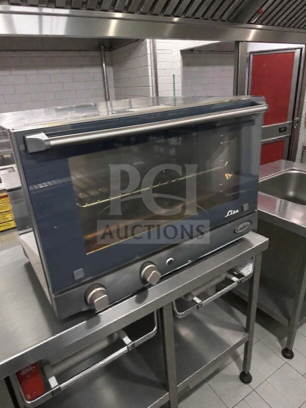 Cadco OV-013 commercial countertop convection oven, stainless steel, fully operational, NSF & UL listed, 120V, excellent condition.