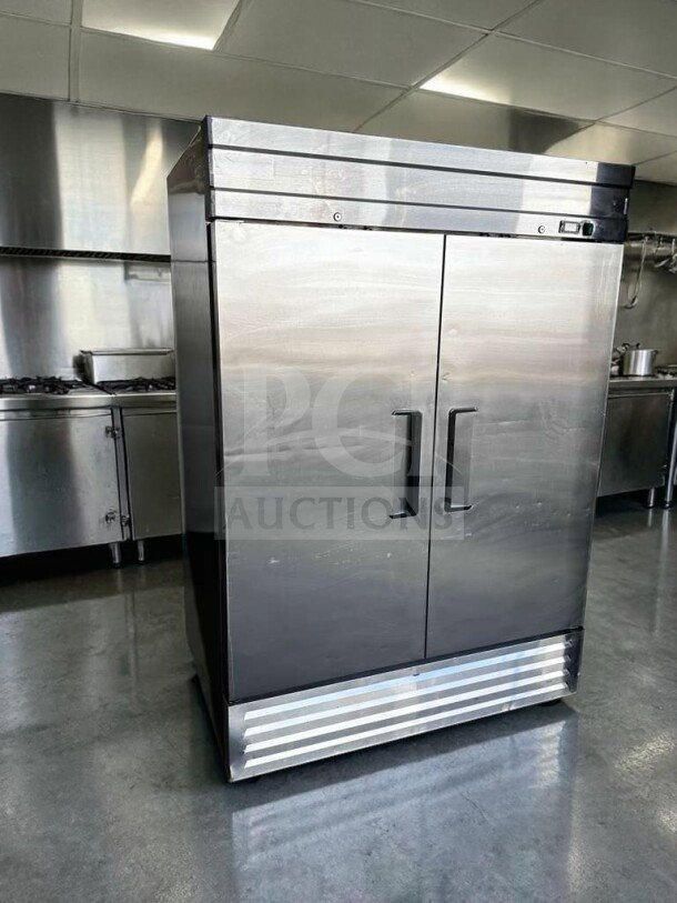 Pristine Genkraft S1200N 2-door commercial stainless steel upright freezer, fully tested, and operational in excellent condition.