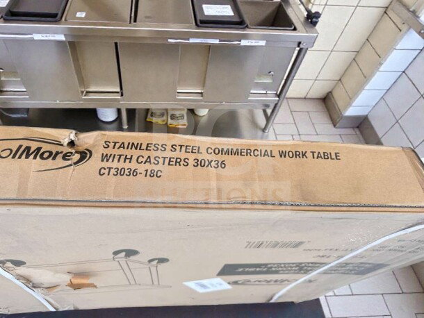 Brand new KoolMore CT3036-18C stainless steel commercial work table with casters, 30"x36", in original box, NSF listed.
