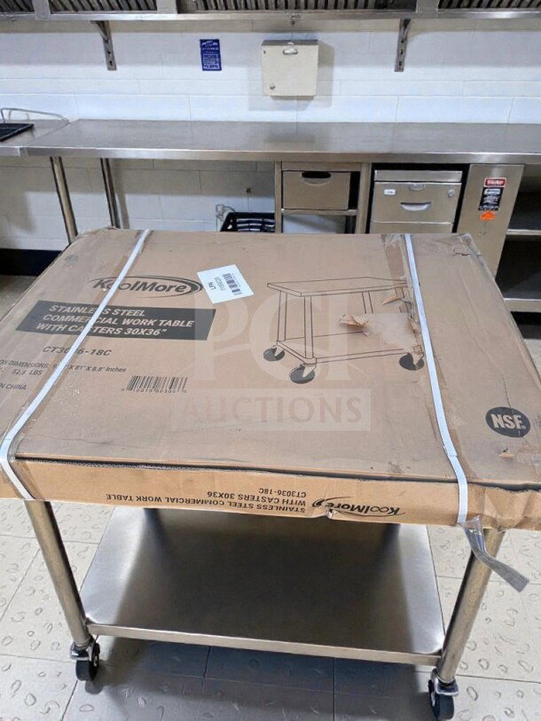 Brand new KoolMore CT3036-18C stainless steel work table with casters in original packaging, 30"x36", NSF listed.