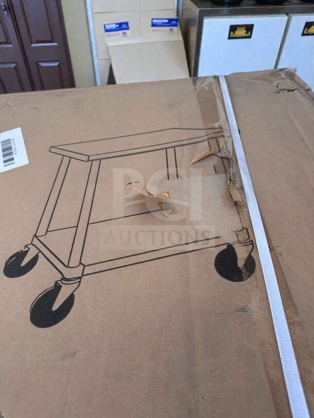 Brand new KoolMore CT3036-18C stainless steel work table with casters, 30" x 36", in original box, NSF listed.