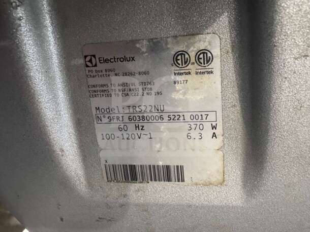 Label on Robot Coupe TRS 22 food processor indicating model TRS22NU, 370 W, 60 Hz, conforms to ANSI/UL STD763, CSA certified.