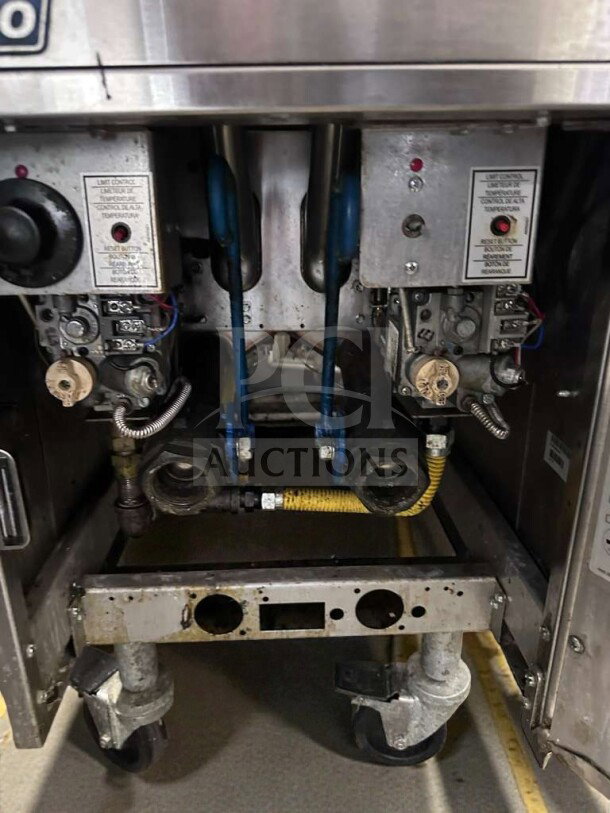 Pitco SG14T gas fryer interior, showing controls and gas connections; NSF & ETL listed, 40 lb capacity, tested operational.