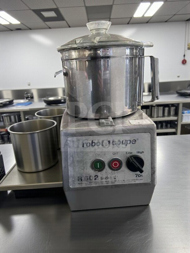Robot Coupe R602 stainless steel food processor, fully tested, UL & NSF listed, in premium condition with 7 qt capacity.