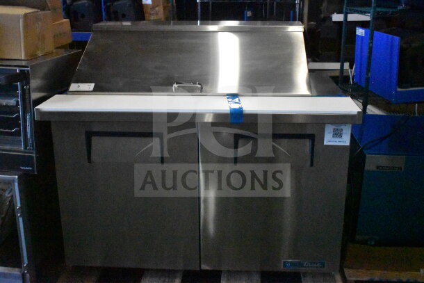 Brand new True TSSU-48-18M-B-HC sandwich salad prep table, bain marie mega top, 115V, with visible label and slight scratches.