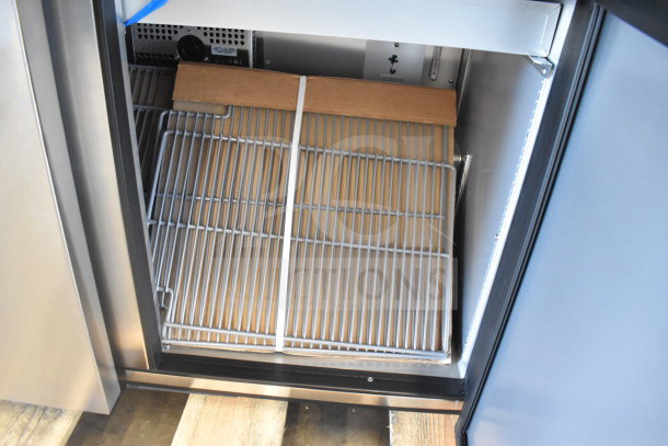 Brand new True TSSU-48-18M-B-HC prep table inner shelving; 115V, 1 phase. Scratch and dent; includes cardboard packaging.