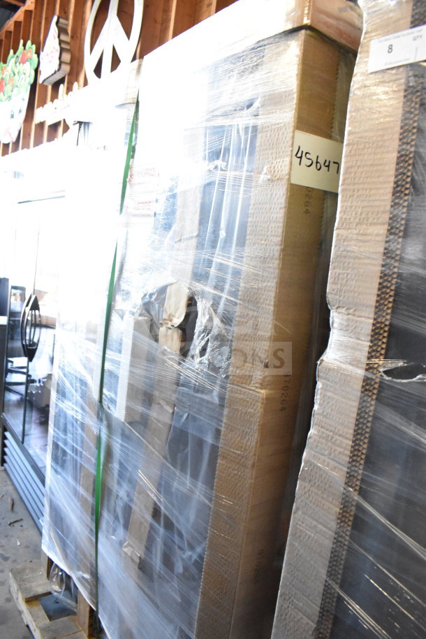 Brand new True TVM-48SL-HC commercial cooler in packaging, showing signs of scratch and dent, visible serial number 910264.