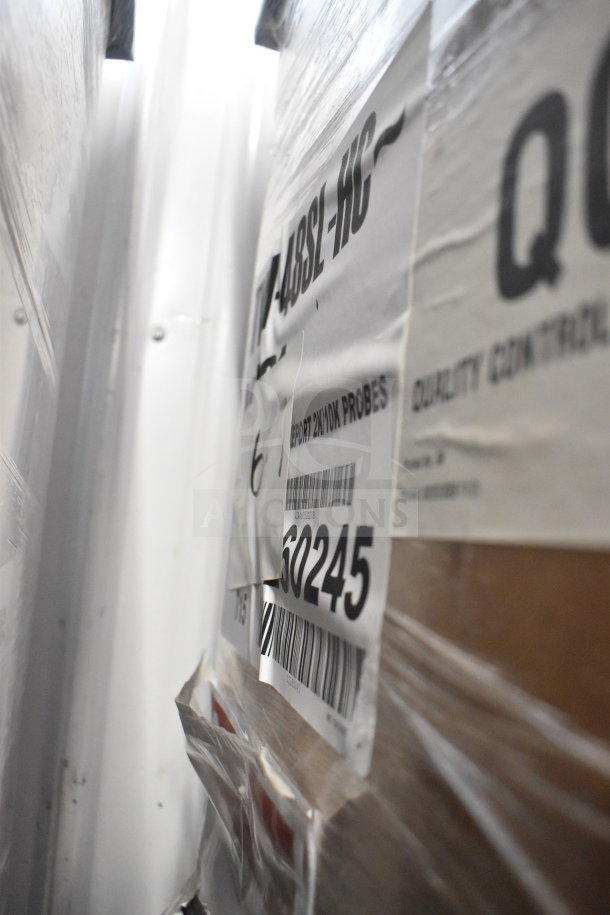 Packaging label for 2025 True TVM-48SL-HC Commercial Cooler Merchandiser. Marked as scratch and dent. 115 Volts, 1 Phase.
