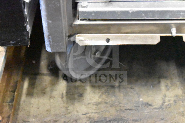 2024 Desmon GBF-15+ETL stainless steel blast chiller detail, featuring a durable caster wheel, 220V, 3-phase.