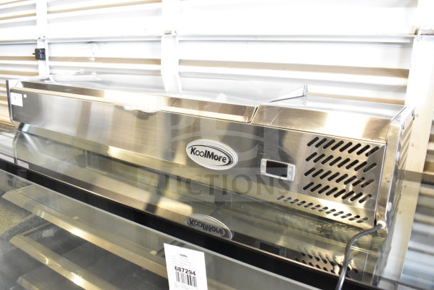 Brand new KoolMore SCDC-6P-SSL 59" refrigerated condiment prep station, six pans, stainless steel, minor scratches, 115V, 1 phase.