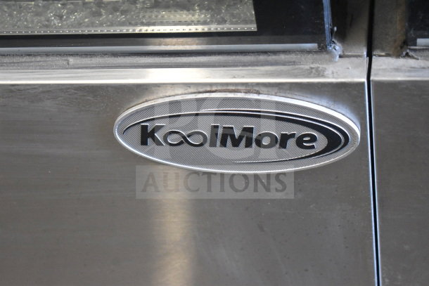 KoolMore Deli Display Case, brand new with scratches, showing logo on stainless steel exterior.
