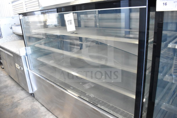 Brand new KoolMore deli display case, floor model, with minor scratches and dents. Features clear glass and multiple shelves.