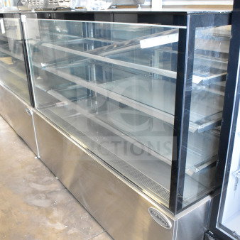 Brand new KoolMore commercial deli display case, floor style, minor scratches, stainless steel, glass shelves.