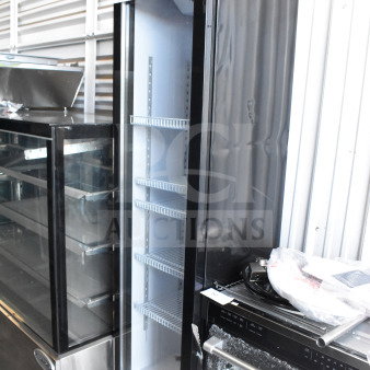 Brand new KoolMore KM-MDR-17S slim commercial refrigerator, 7 Cu. Ft., black, marked "scratch and dent", 115V, 1 phase.