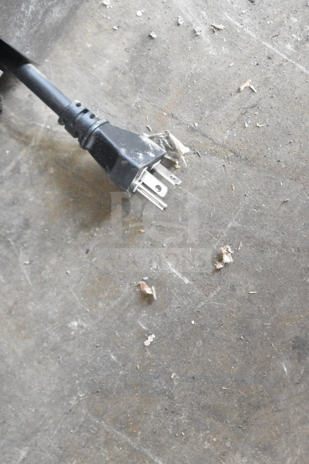 KoolMore KM-MDR-17S refrigerator power cord on concrete floor. Brand new scratch and dent condition.