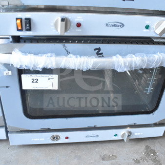 BRAND NEW KoolMore KM-CTCO-15 countertop convection oven, 23 in., 1600W, for half-size pans, four racks, visible controls.