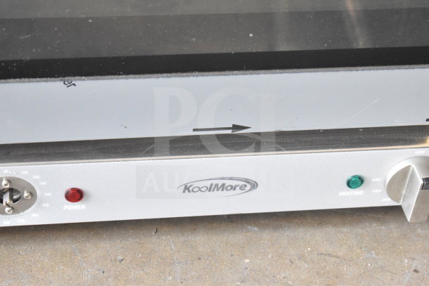 Brand new KoolMore KM-CTCO-15 countertop convection oven, 23-in, silver, with visible logo and dial controls.