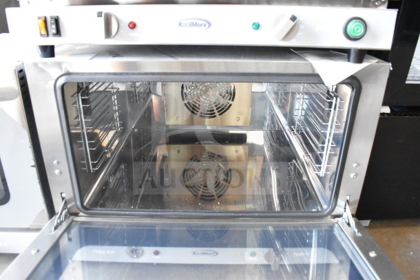 Brand new 2025 KoolMore KM-CTCO-15 countertop convection oven, stainless steel, 23 in., 4 racks, 1600W, visible control panel.