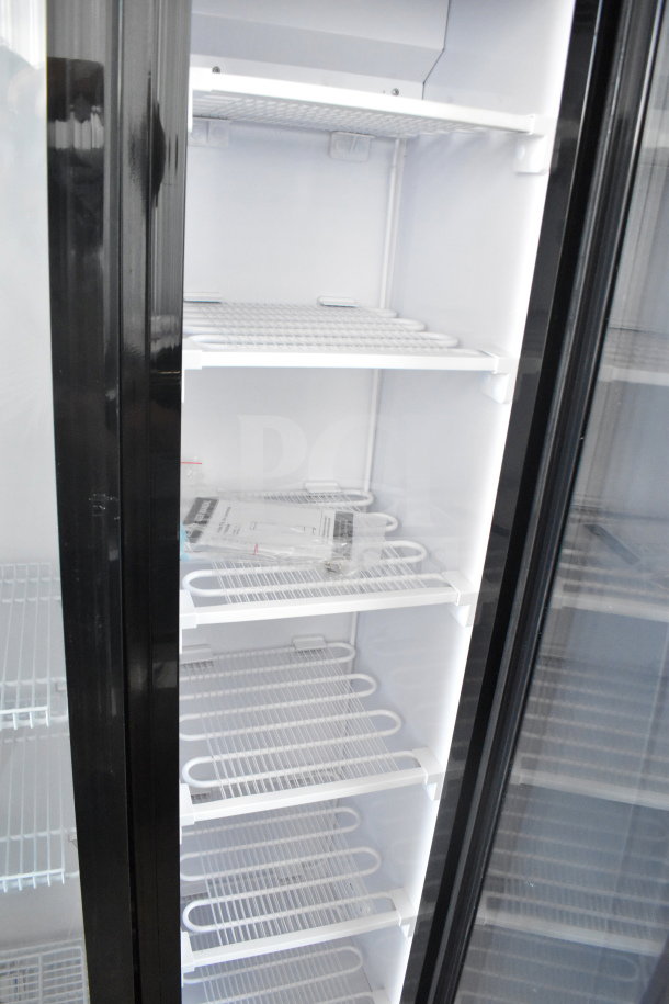 KoolMore KM-MDF-17S 17 in. Slim Merchandiser Freezer, new condition, scratch and dent, 7 Cu. Ft., black, 110-120V.