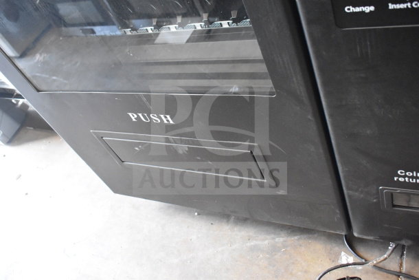 BRAND NEW SCRATCH AND DENT KoolMore commercial vending machine, minor surface scratches, "PUSH" label visible.