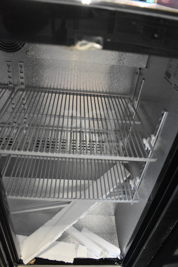 BRAND NEW 2026 KoolMore BC-2DSL-BK back bar refrigerator, 7.4 cu ft, two-door; some cosmetic scratches and dents visible.