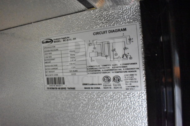 Alt text: KoolMore BC-2DSL-BK label detailing specifications for a 35-inch two-door back bar refrigerator, 7.4 Cu Ft, 115 Volts.