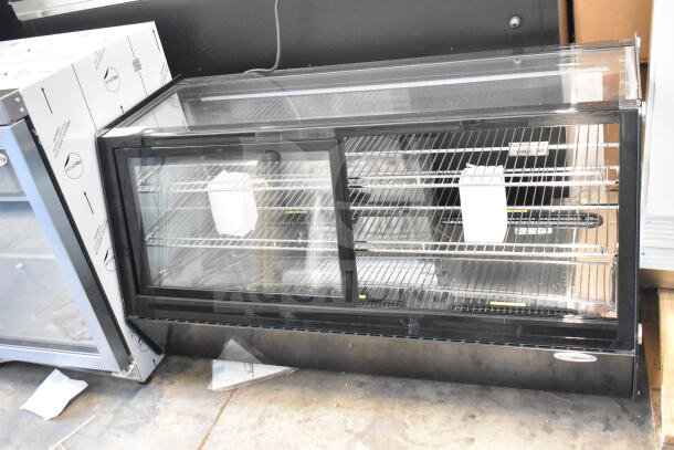 Brand new KoolMore countertop display case merchandiser, 115V, 1 phase, with glass front; minor scratch and dent.