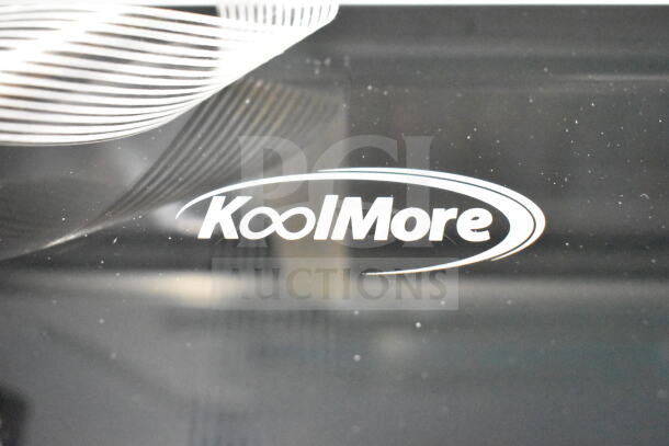 KoolMore KM-RER36-FDPR brand logo on refrigerator panel, model KM-RER36-FDPR. Scratch and dent condition.
