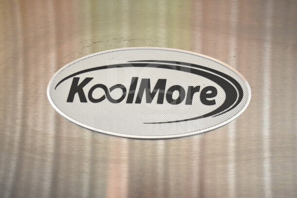 Brand new KoolMore RIR-2D-SS reach-in refrigerator logo on stainless steel finish.