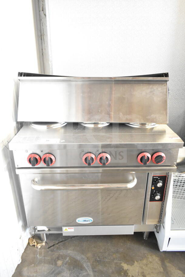 Brand new KoolMore commercial 6-burner hot plate range with oven and overshelf, minor scratches and dents, stainless steel.