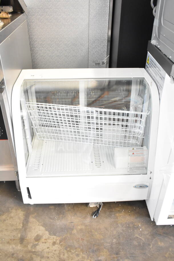 Brand new KoolMore CDC-3C-WH countertop display refrigerator, 3.6 Cu Ft, 115 Volts, visible warning label, minor scratches.