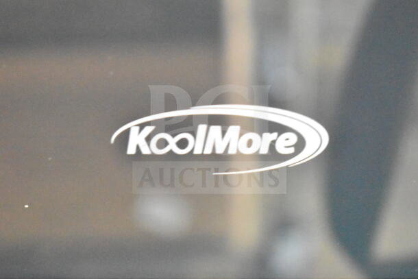 Brand new KoolMore countertop drawer microwave, scratch and dent condition, 115 volts, 1 phase, with visible logo.
