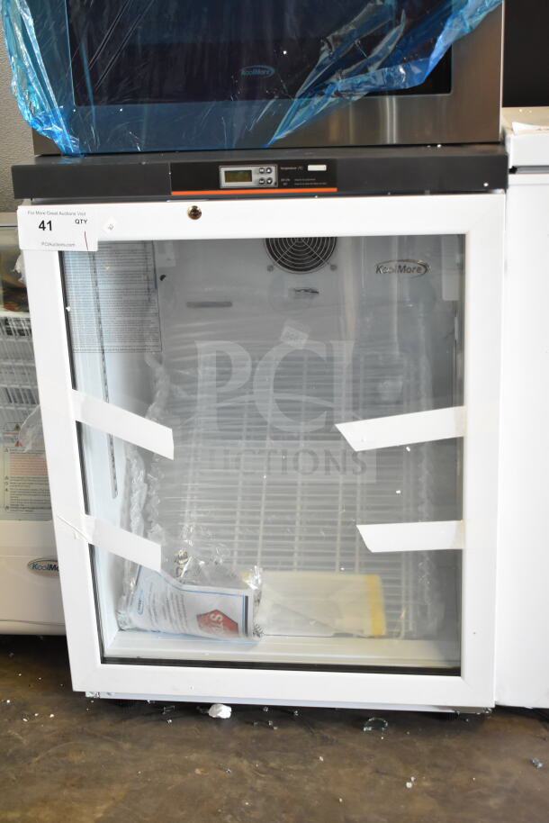 Brand new KoolMore KM-PHR-45C 4.5 cu ft electric medical refrigerator merchandiser, 115V, with minor scratches.