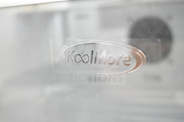 KoolMore KM-PHR-45C medical refrigerator brand logo on its surface. New with minor scratches and dents. 4.5 cu ft capacity.