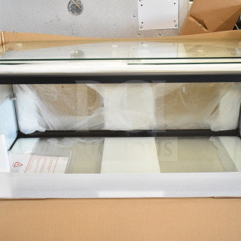 Brand new KoolMore dry display case merchandiser in original packaging. Scratch and dent condition. Visible KoolMore logo.