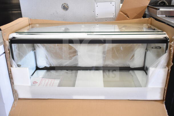 Brand new KoolMore dry display case merchandiser, glass construction, minor scratches, shown in original packaging.